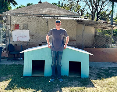 Volunteers Help Make NewDog Houses